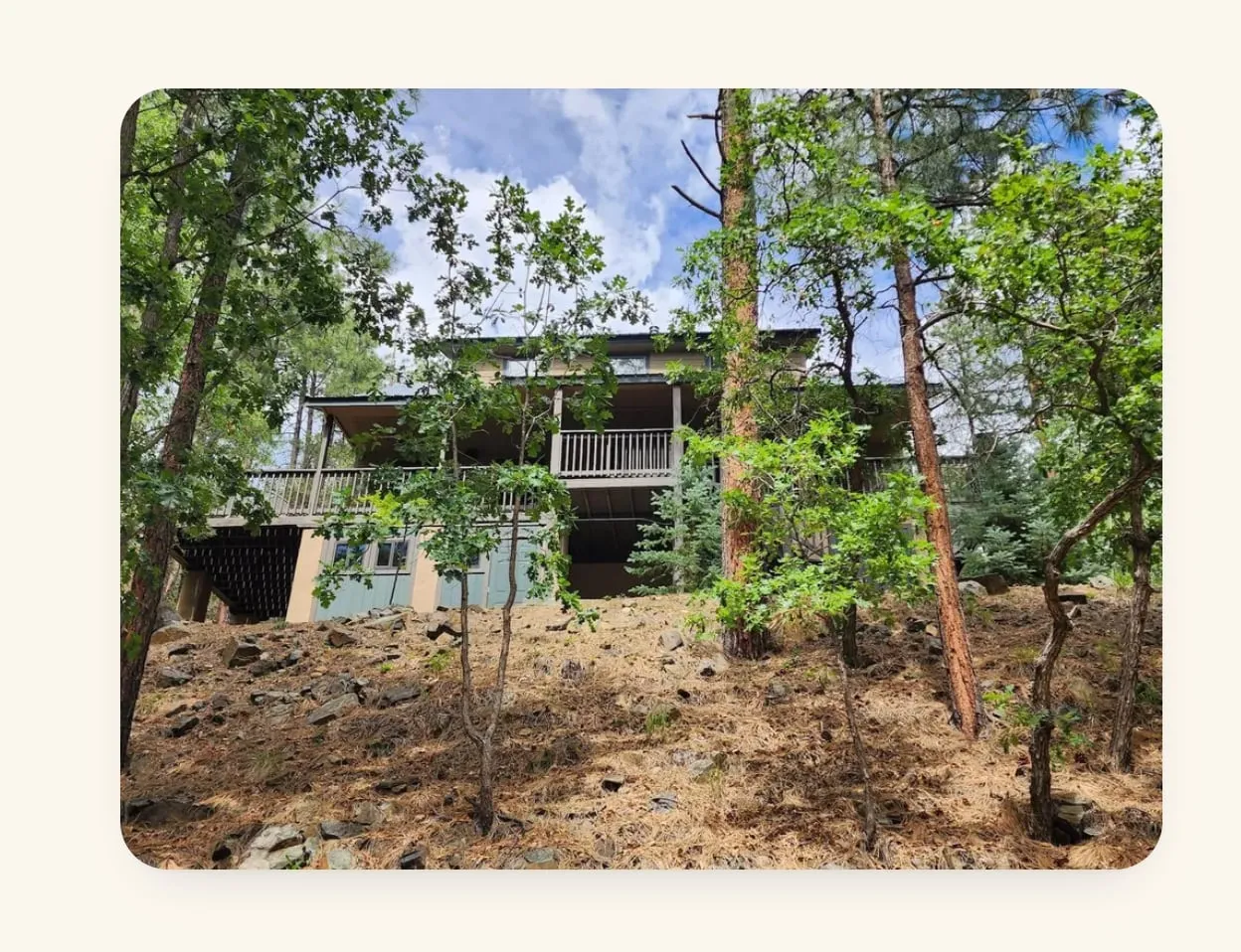 A cabin tucked into the ponderosa pines on a Groom Creek hillside near Prescott, Arizona