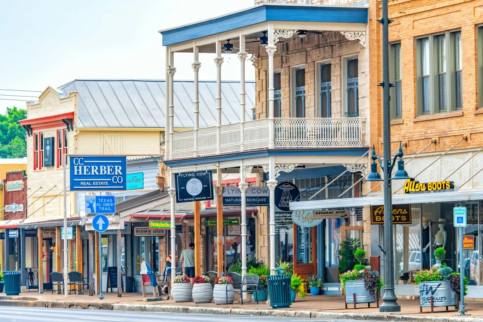 Historic storefronts and balconies along a downtown Prescott street